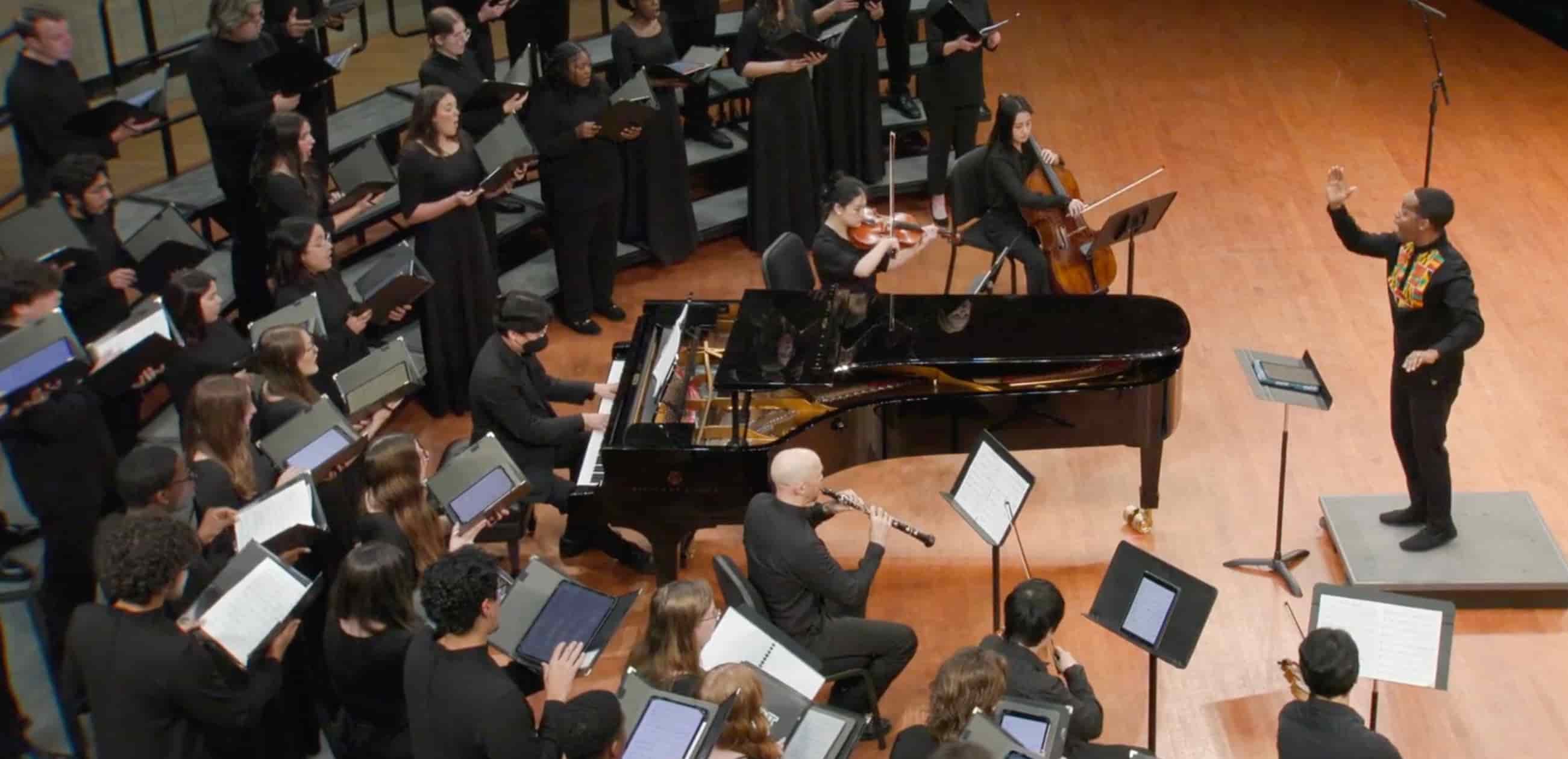 Dr. Marques L. A. Garrett conducting University Singers