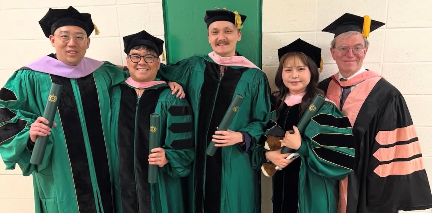 DMA Graduates pose with Dr. Eric Nestler for a celebratory photo
