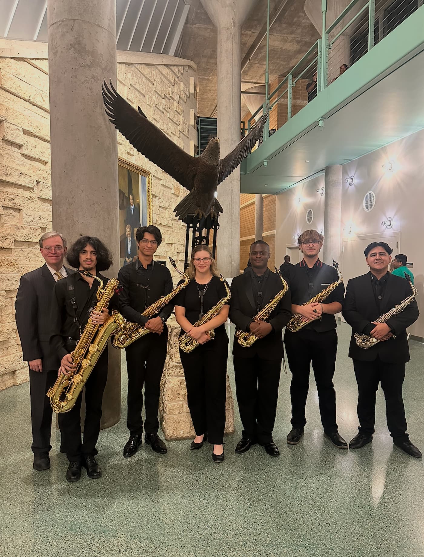 UNT Saxophonists pose with Dr. Nestler for a celebratory photo after a concert