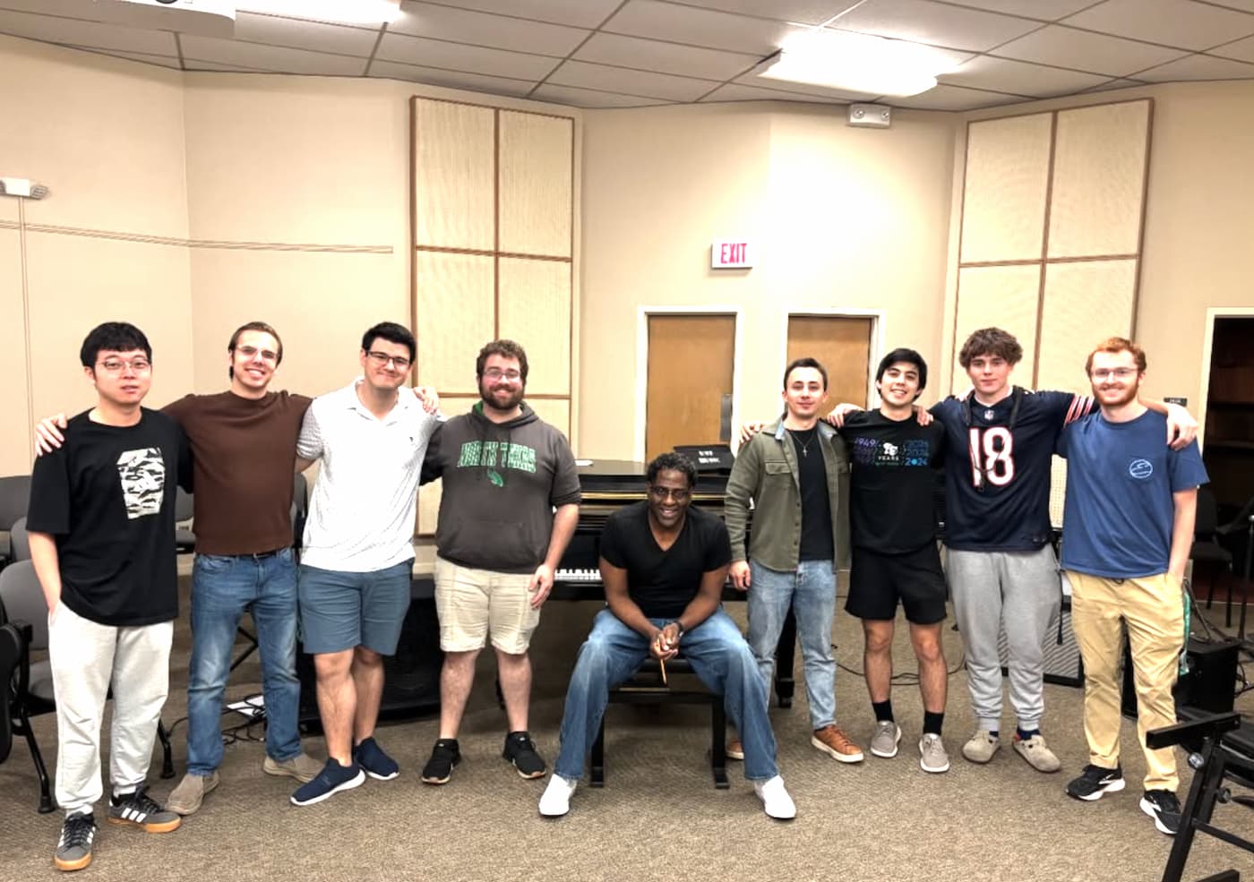 Graduating seniors in the jazz saxophones studio take a photo with Professor Brad Leali