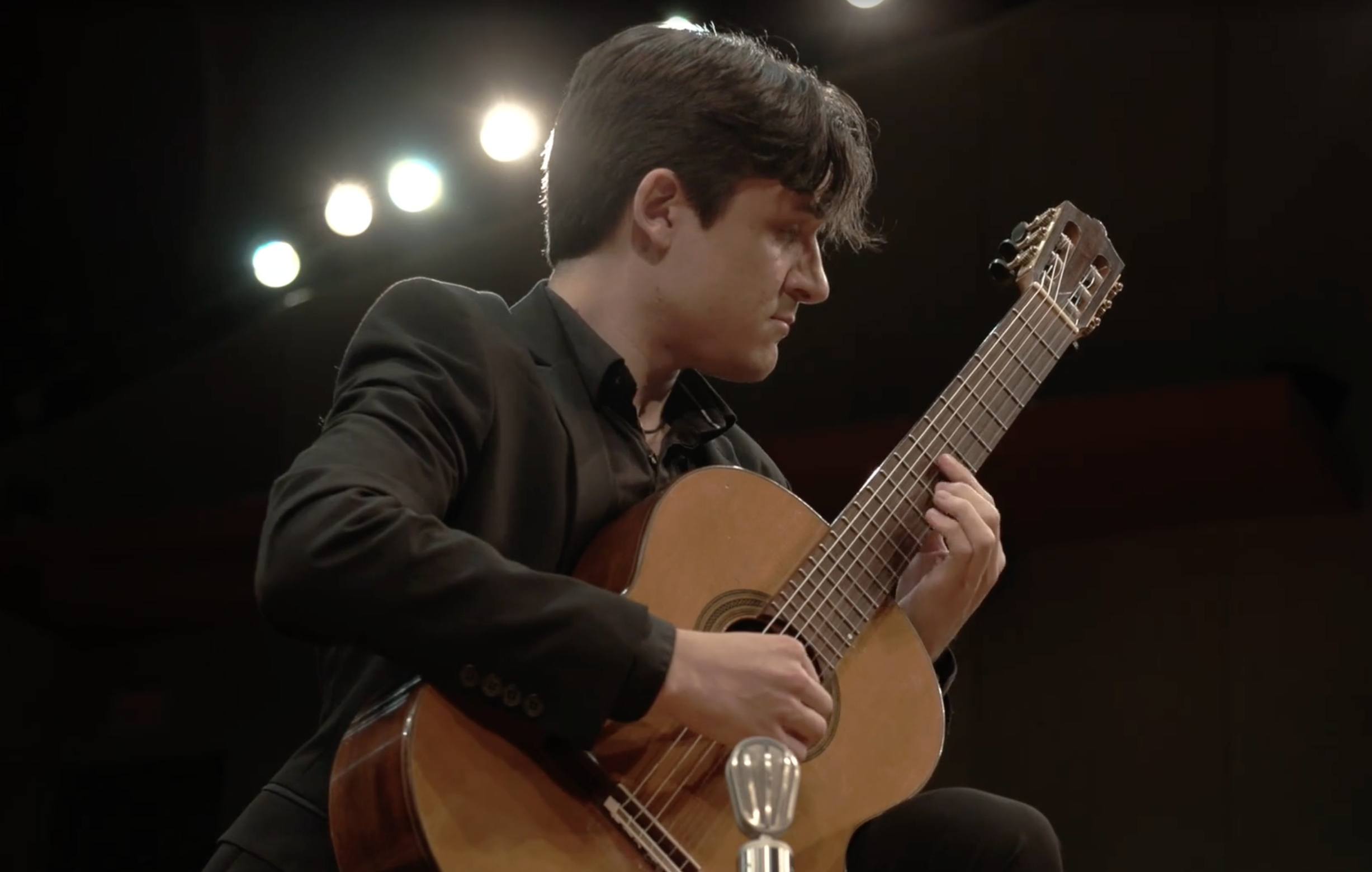 guitar student performing