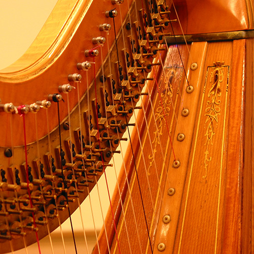 Close-up image of a harp